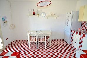 Dining - Casa Sciro: A cheerful two-story independent house situated at a short distance from the beach, with Free WI-FI. (Patù)
