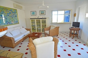 TV - Casa Sciro: A cheerful two-story independent house situated at a short distance from the beach, with Free WI-FI. (Patù)