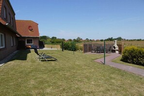 Outdoor dining - Holiday apartment with 2 bedrooms (Neßmersiel)