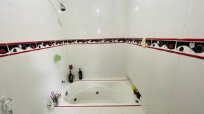 Shower, jetted tub, hair dryer, towels