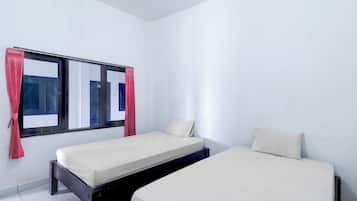 Habitación Deluxe con 2 camas individuales | Wifi gratis y ropa de cama