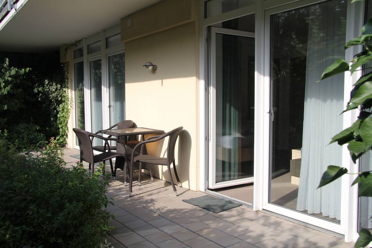 Apartment, Garden Area | Hypo-allergenic bedding, desk, laptop workspace, blackout drapes