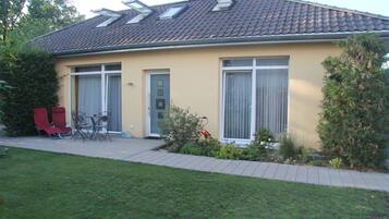 Apartment, Garden Area | Hypo-allergenic bedding, desk, laptop workspace, blackout drapes