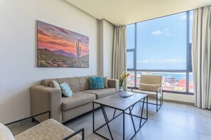 602 - Sea view 1 Bedroom | Living room | 43-inch Smart TV with cable channels, streaming services - Gate 9 Tower -Studios & Apts Mar Mikhael (Beirut)