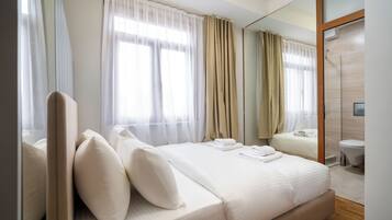 Egyptian cotton sheets, premium bedding, in-room safe, laptop workspace