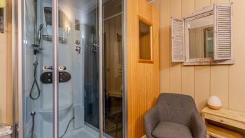 Shower, hair dryer, towels