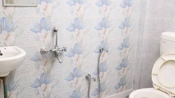 Standard Double Room | Bathroom | Shower, rainfall showerhead, free toiletries, slippers