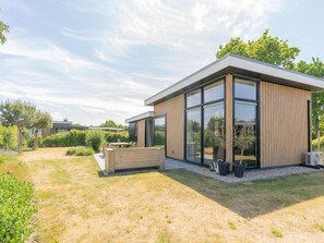 Exterior - Enjoy the outdoors in this luxury chalet at Duinvilla’s Schouwenduin with a large sliding door, high (BURGH-HAAMSTEDE)