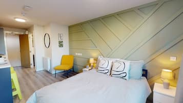 1 slaapkamer, een strijkplank/strijkijzer, wifi, beddengoed