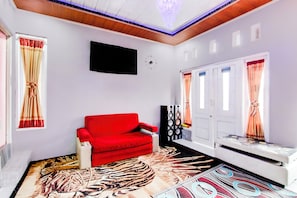 32-inch flat-screen TV with cable channels