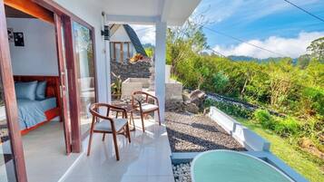 Deluxe Room, Patio, Mountain View | Terrace/patio