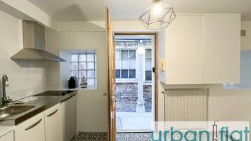 Microwave, coffee/tea maker, cookware/dishes/utensils