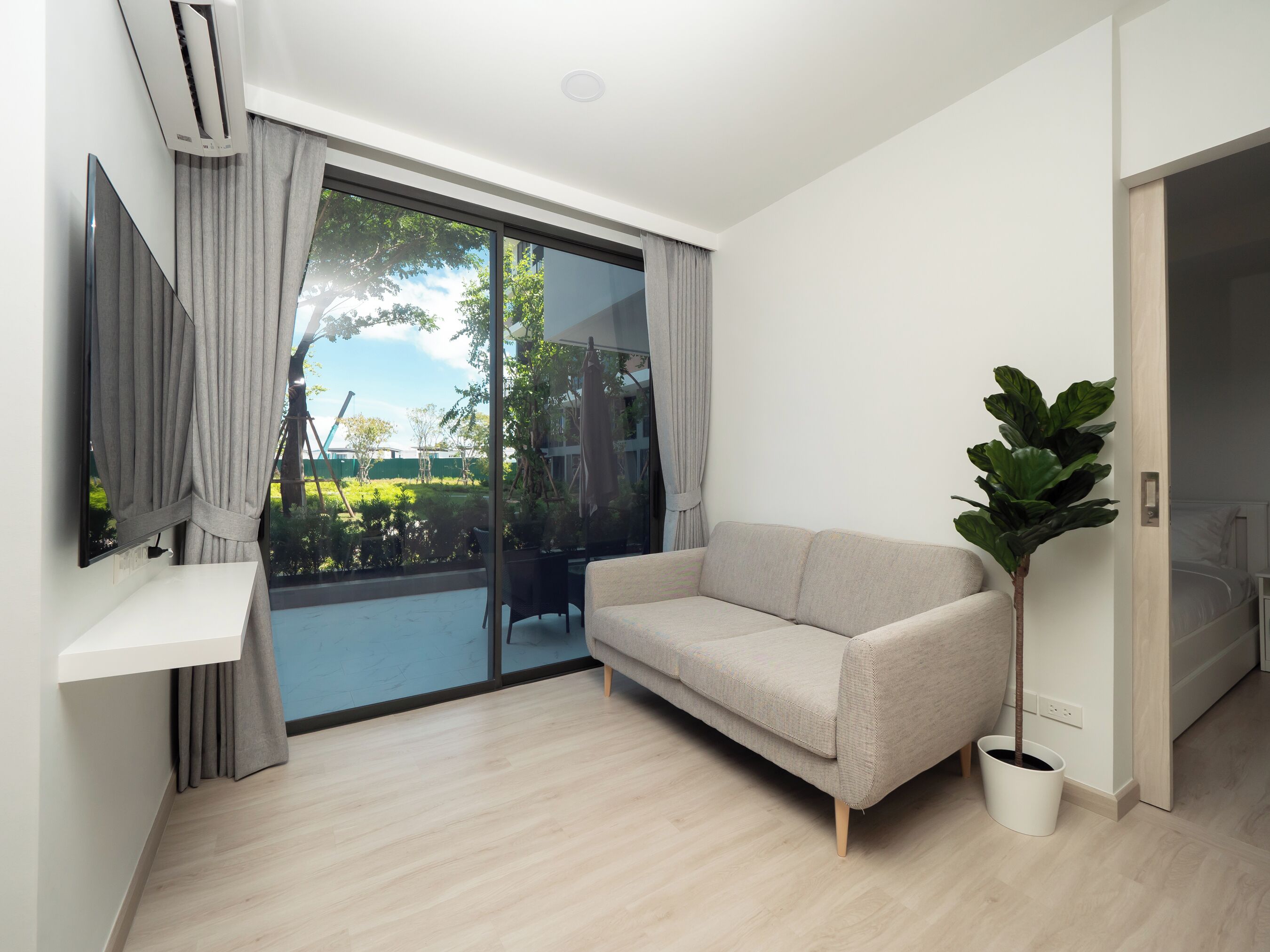 Superior Apartment | Living area | Flat-screen TV