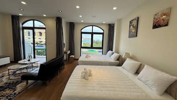Superior Quadruple Room, Balcony, Garden View | Desk, free WiFi, bed sheets