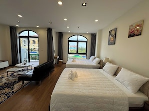 Superior Quadruple Room, Balcony, Garden View | Desk, free WiFi, bed sheets