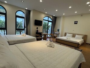 Family Room, Multiple Beds, Balcony, Garden View | Desk, free WiFi, bed sheets - Beachside Bliss Homestay (Phu Quoc)