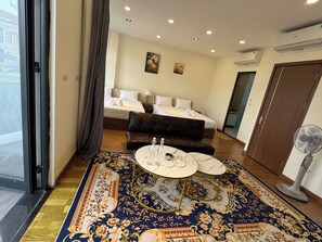 Superior Quadruple Room, Balcony, Garden View | Desk, free WiFi, bed sheets - Beachside Bliss Homestay (Phu Quoc)