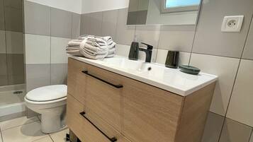 Hair dryer, towels, soap, shampoo