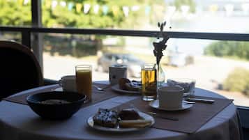 Daily buffet breakfast (EUR 15 per person)