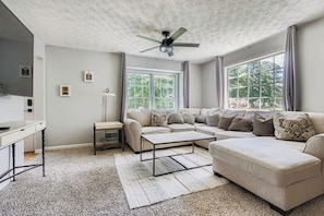 TV, fireplace, offices - Northern Atlanta Retreat | Cozy 4 Bedroom (Marietta)
