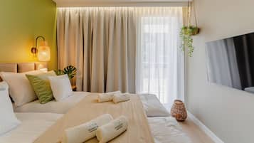 Premium Apartment, Kitchenette, Beachside | Laptop workspace, iron/ironing board, WiFi (free)