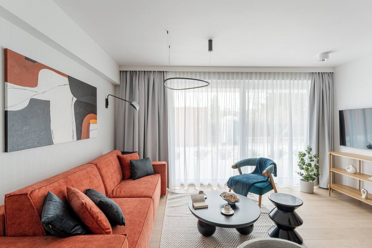 Premium Apartment, Kitchenette, Beachside | Laptop workspace, iron/ironing board, free WiFi