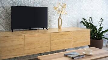 Deluxe appartement | Woonruimte | Een televisie