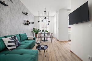 Comfort Apartment | Living area | TV