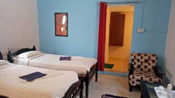 Desk, laptop workspace, free WiFi, bed sheets