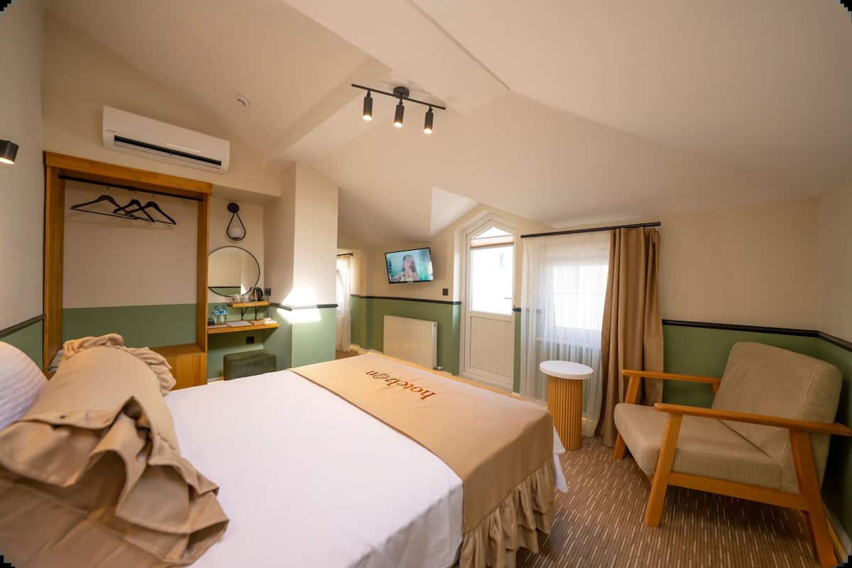 Quarto standard, 1 cama King, vista para a cidade | Roupas de cama premium, camas Select Comfort