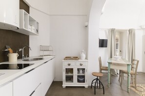 Fridge, electric kettle, toaster, cookware/dishes/utensils