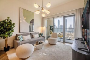 Apartamento superluxo, sacada, vista para a cidade | Área de estar