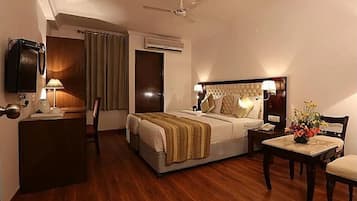 Premium bedding, memory-foam beds, desk, laptop workspace