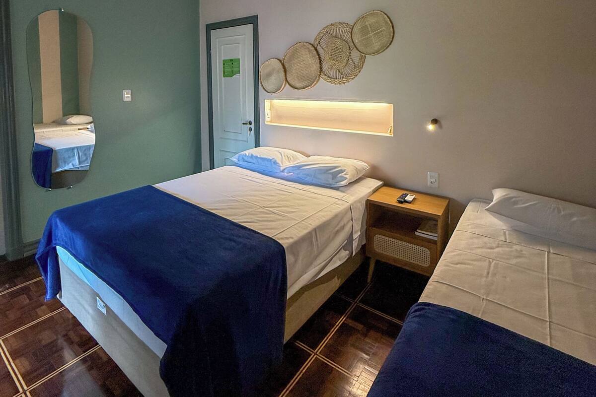 Deluxe Triple Room, City View | Iron/ironing board, free WiFi