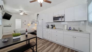 Fridge, microwave, stovetop, coffee/tea maker