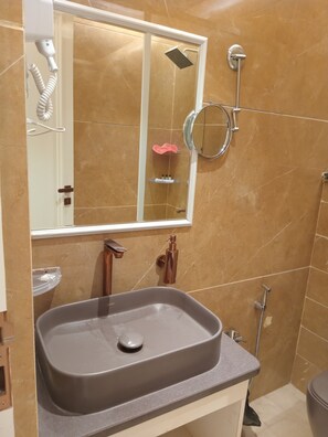 Shower, towels, soap, shampoo