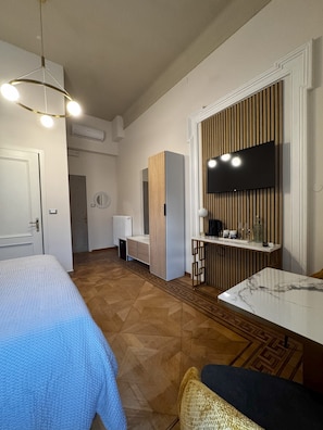 Deluxe Room, City View | In-room safe, desk, laptop workspace, free WiFi