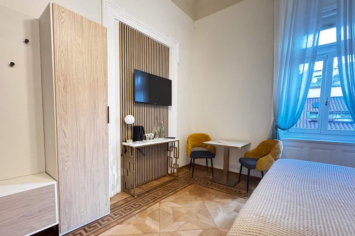 Deluxe Room, City View | In-room safe, desk, laptop workspace, free WiFi
