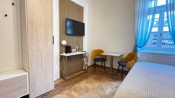 Deluxe Room, City View | In-room safe, desk, laptop workspace, free WiFi