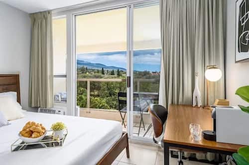 Apartamento Deluxe, 2 camas de matrimonio, Aire acondicionado, vistas al mar | Sábanas de algodón egipcio y ropa de cama de alta calidad