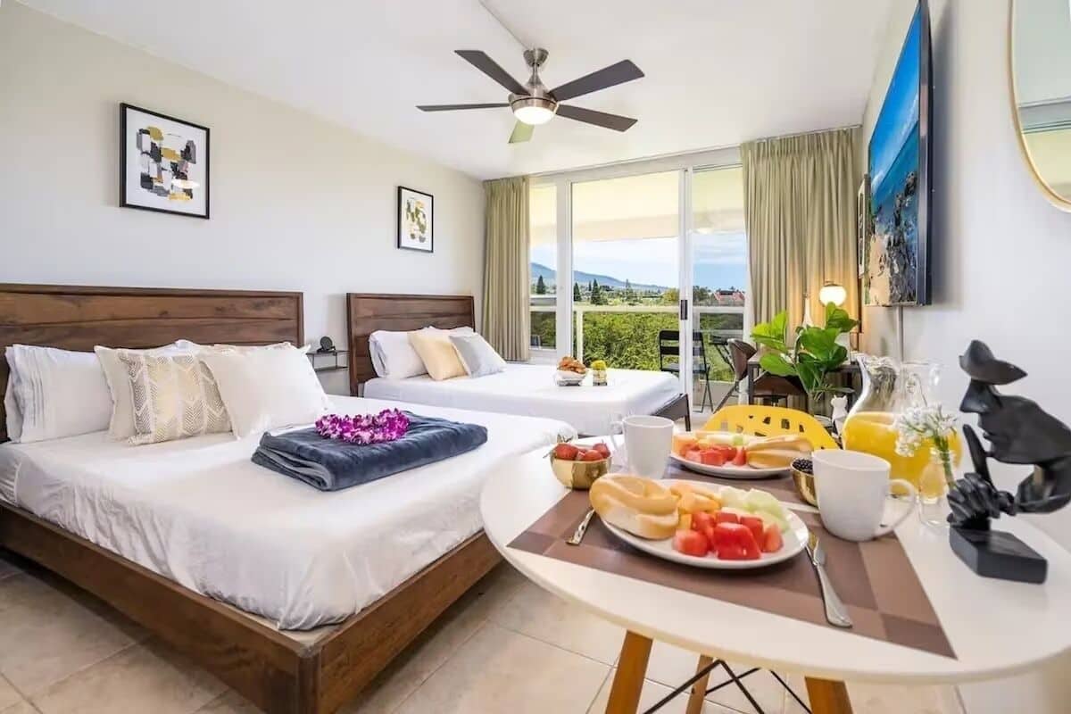 Deluxe Apartment, 2 Queen Beds, Air conditioning, Ocean View | Desk, laptop workspace, blackout drapes, iron/ironing board