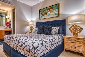 The bedroom features a comfortable king size bed