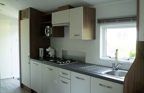 Fridge, microwave, coffee/tea maker, electric kettle