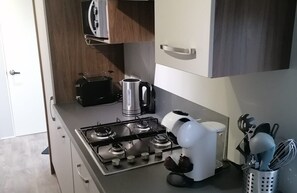 Fridge, microwave, coffee/tea maker, electric kettle