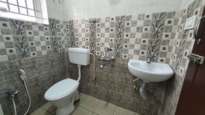 Double Room With Garden View | Bathroom | Shower, rainfall showerhead, free toiletries, slippers - JR Service Apartment  (Coimbatore)