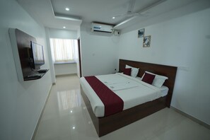 Double Room With Garden View | Laptop workspace, free WiFi, bed sheets - JR Service Apartment (Coimbatore)