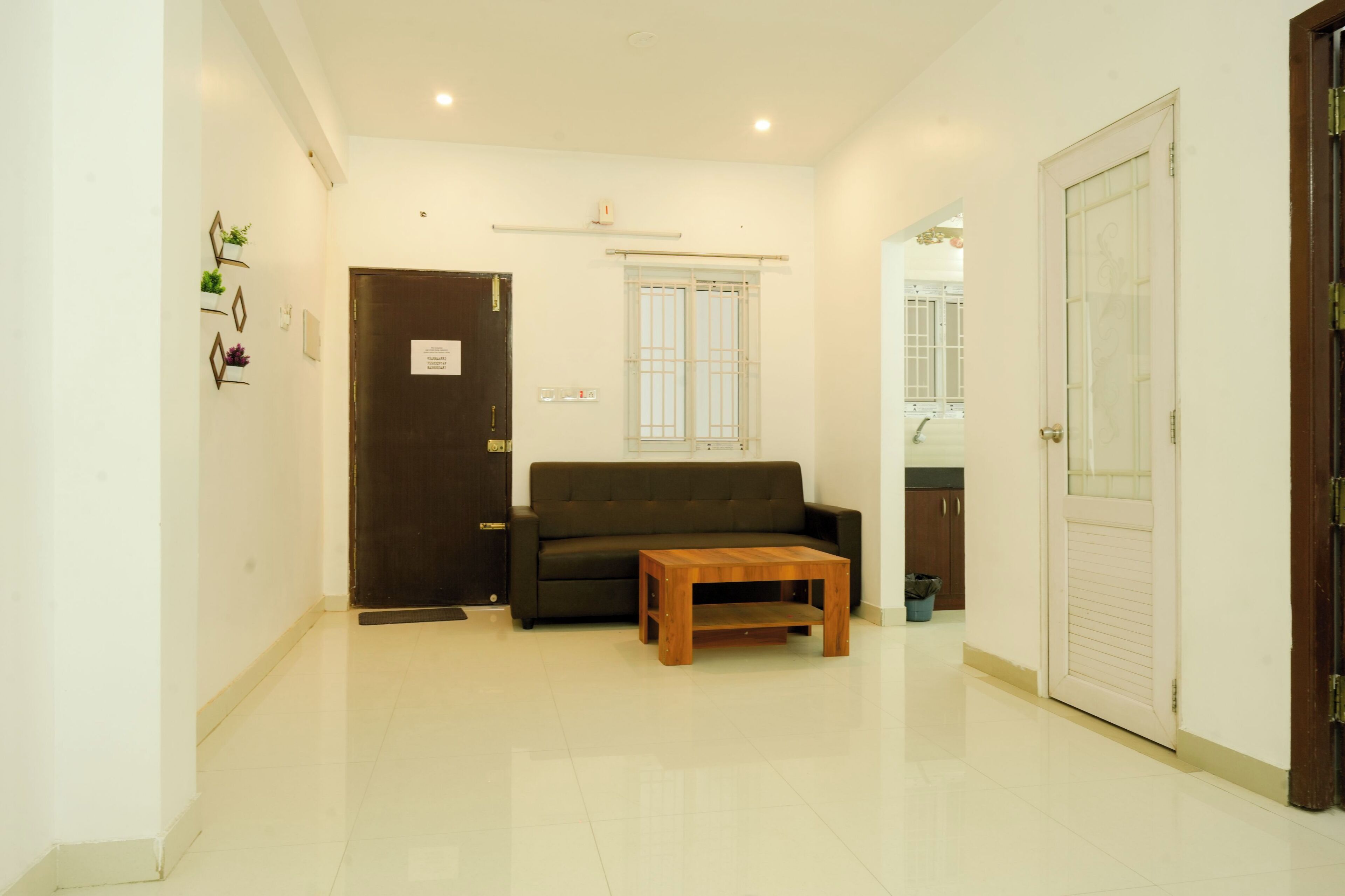 Two-Bedroom Apartment with City View | Living area | 32-inch LED TV with satellite channels