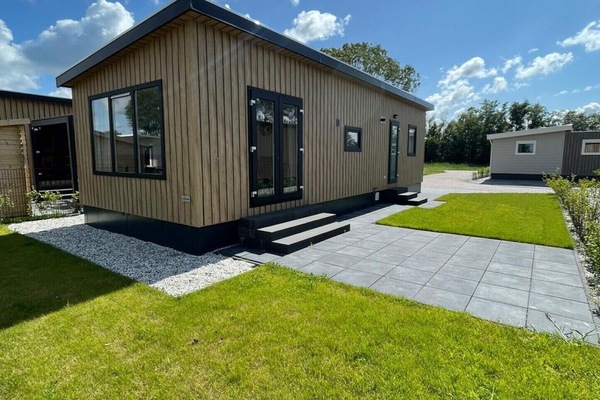 Front and garden of Holiday Park De Zeeuwse Parel - North Sea