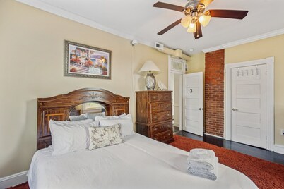 Charming Victorian Home With Porch & Large Yard 7 Bedroom Home