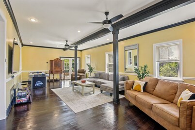 Charming Victorian Home With Porch & Large Yard 7 Bedroom Home